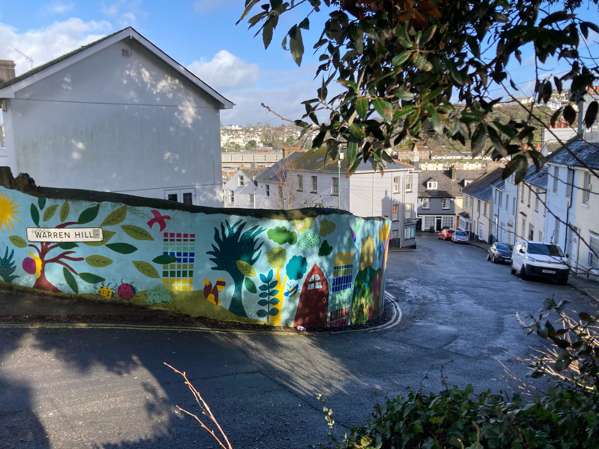 An image of Warren Hill in Torquay. the image features a colourful mural