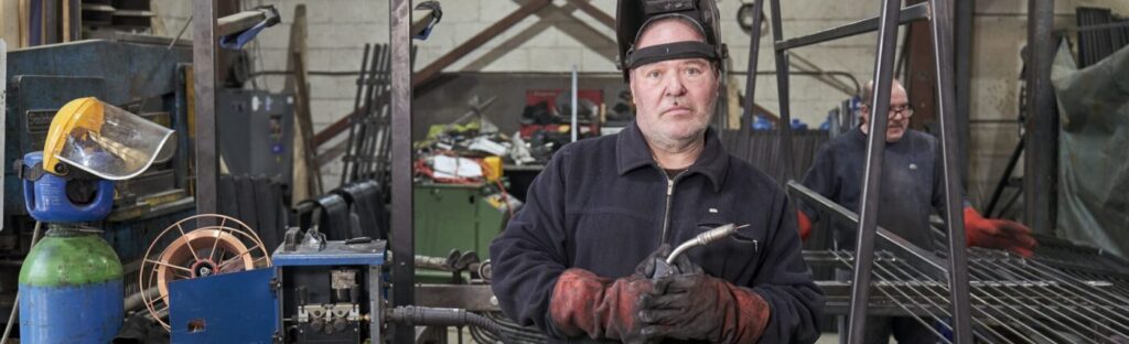 Centre for Better Ageing image: men working in a welding business.